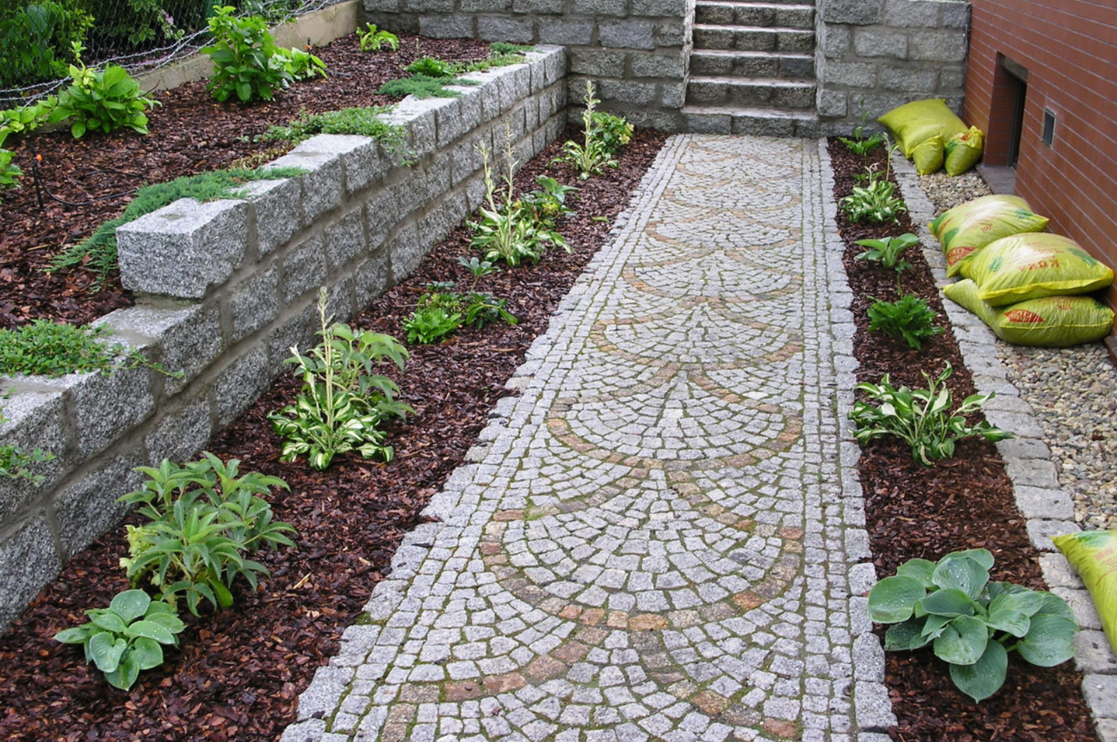 Landscaped garden area with paving